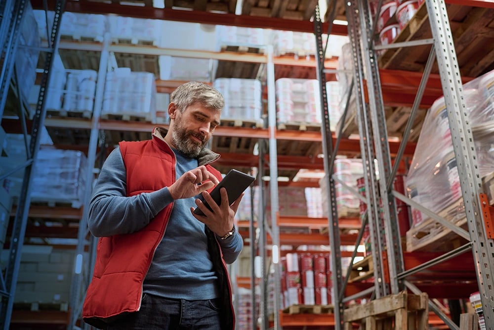 Warehouse worker on phone